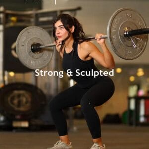 A woman in black workout clothes squats with a heavy barbell in a gym. Text reads: “FWS FitWithSara,” the product name “Strong & Sculpted,” and “4 Week Program.” Gym equipment is blurred in the background.